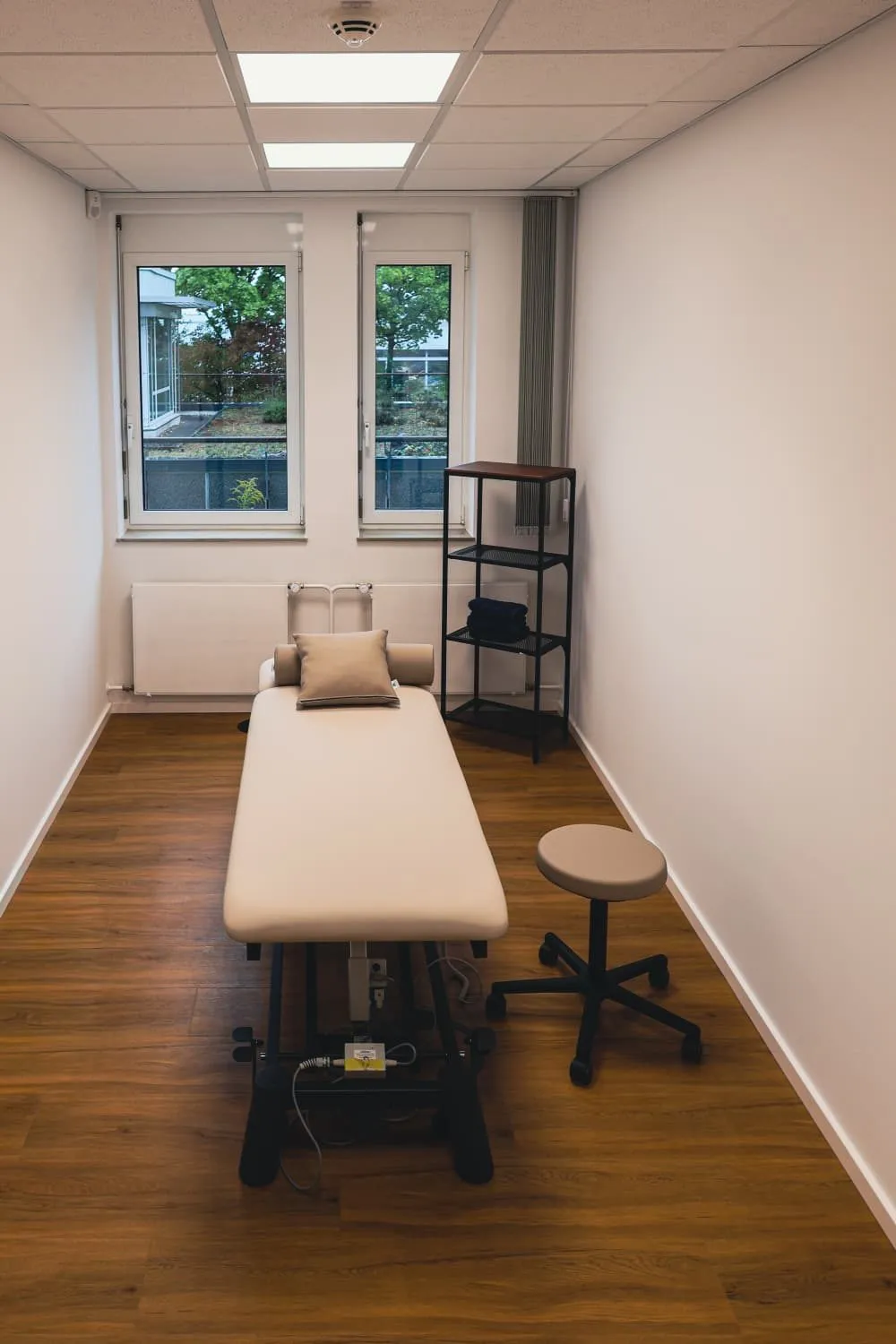 Heller Behandlungsraum der AMILU Ergotherapie in Oberursel